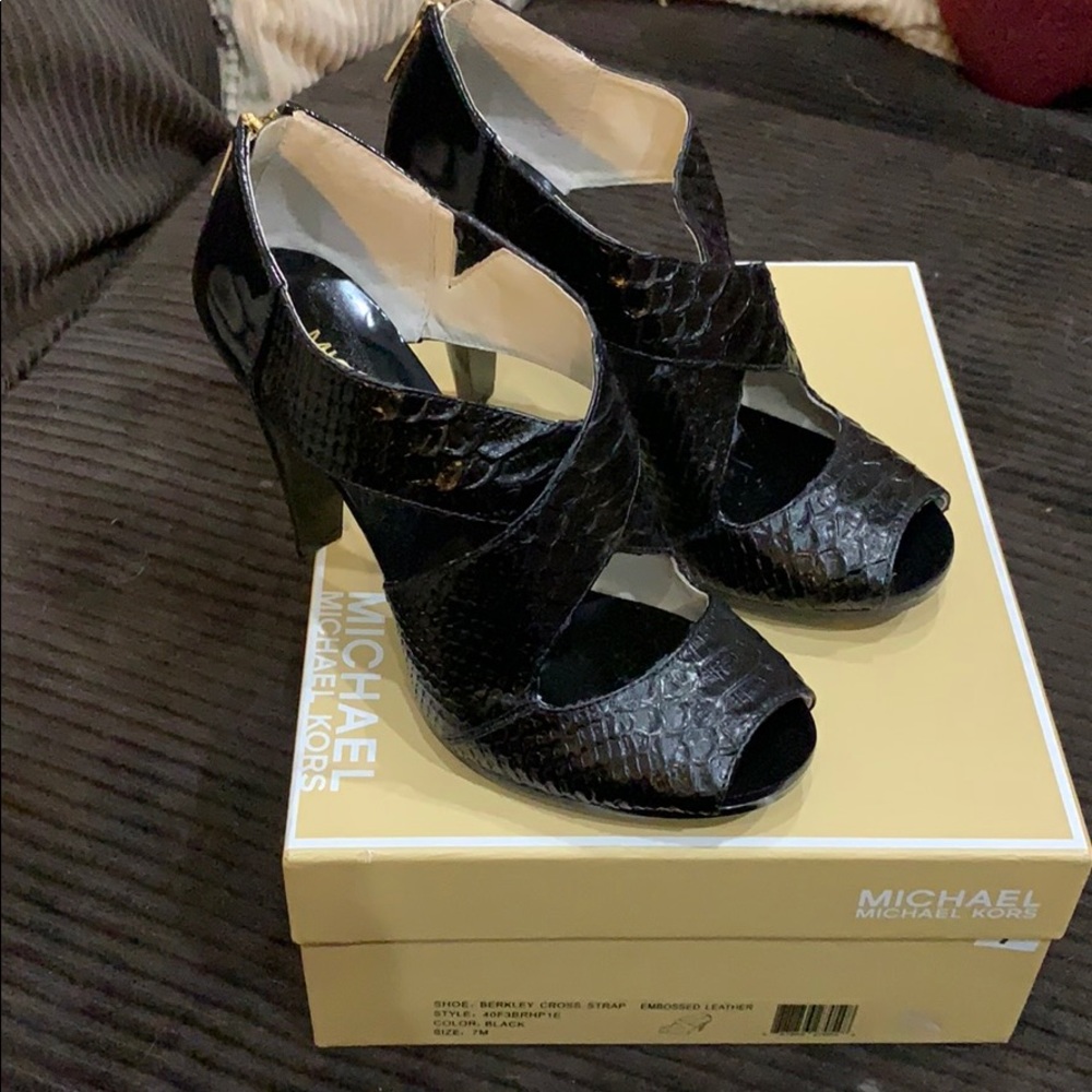 MK heels never worn with box size 7